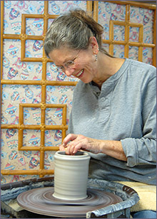 Marianne Cordyack throwing a pot